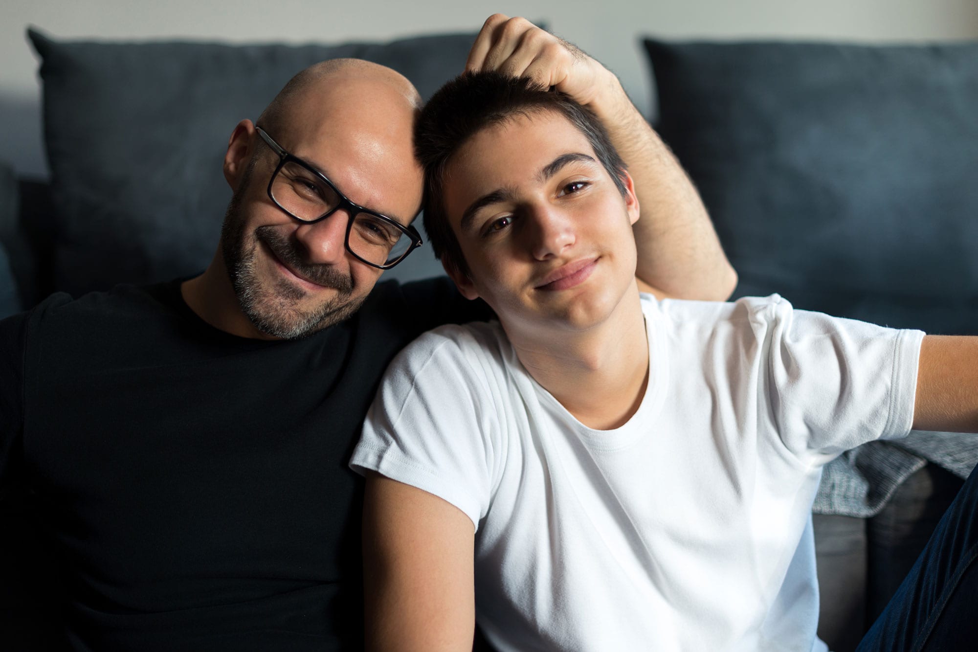 photo of a father and son smiling