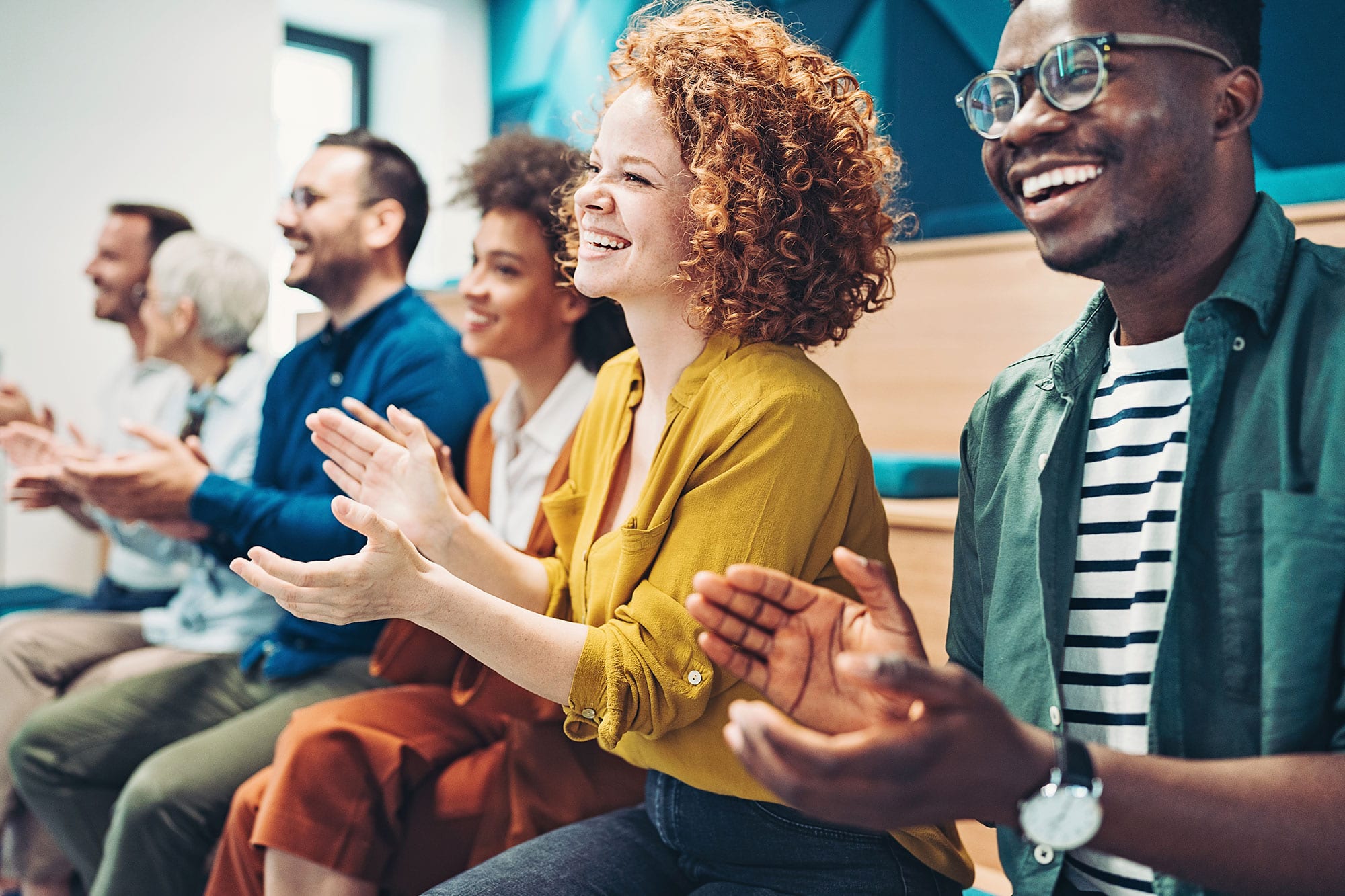 Multi-ethnic group of business persons during a conference